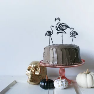 Use your Cricut to cut out these Skeleton Flamingo Cake Toppers for your Halloween party! // Salty Canary