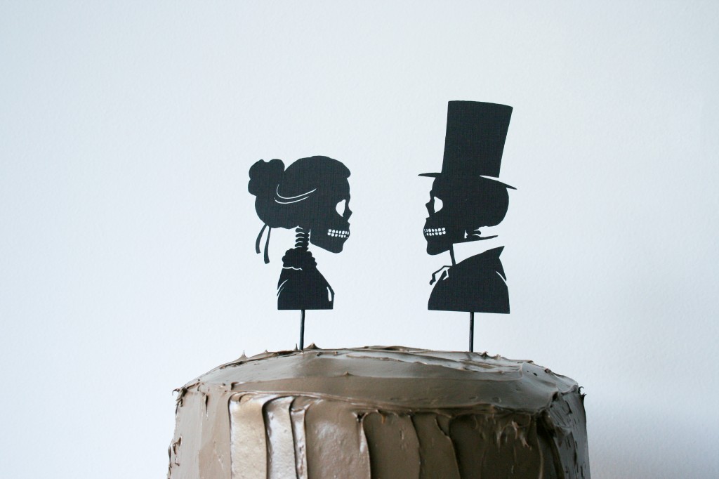 Use your Cricut to cut out these Skeleton Silhouette Cake Toppers for your Halloween party! // Salty Canary