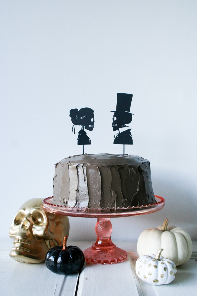 Use your Cricut to cut out these Skeleton Silhouette Cake Toppers for your Halloween party! // Salty Canary