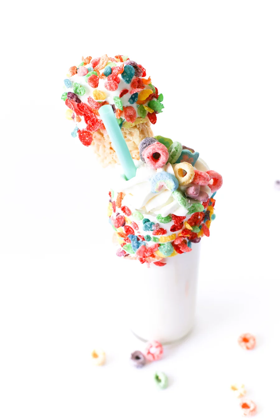 Splurge for breakfast or dessert with this cereal milk milkshake made with cereal-soaked milk, rice krispies treats, and a lot of marshmallow fluff! // Salty Canary 