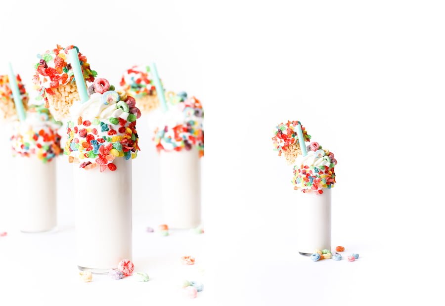 Splurge for breakfast or dessert with this cereal milk milkshake made with cereal-soaked milk, rice krispies treats, and a lot of marshmallow fluff! // Salty Canary 