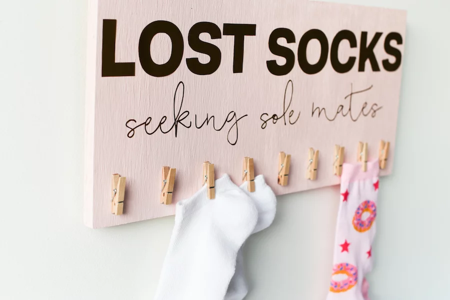 Make this DIY Lost Socks Sign so all of your single socks can find their sole mates! // saltycanary.com