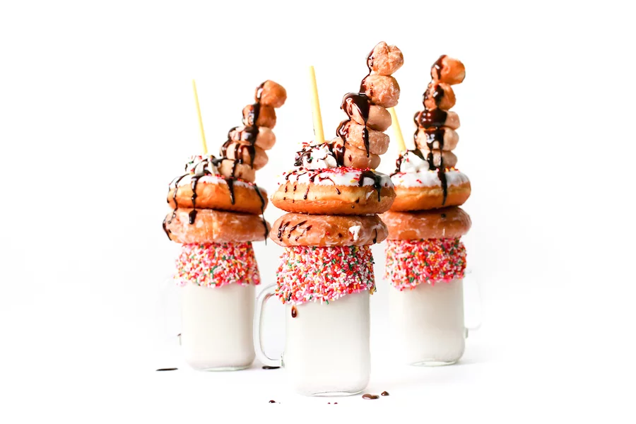 Have dessert for breakfast with this over-the-top and decadent Donut Milkshake which is perfect for sharing with your other half this Sunday! Don't forget the sprinkles!