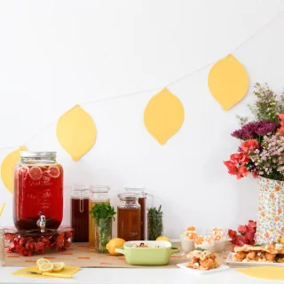 Throw a Southern-Style Spring Brunch Party to celebrate the arrival of spring complete with an Iced Tea Bar, Chicken & Waffle Sliders, and Peach Coconut Grits! The perfect backdrop for Easter, Mother's Day, a spring bridal or baby shower!