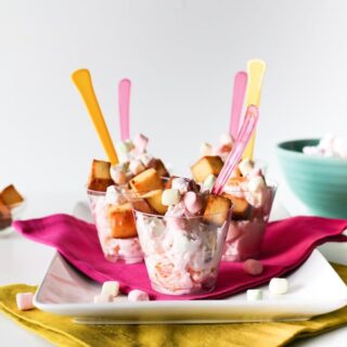 Try this throwback recipe with a fun twist: Ambrosia Salad with Pound Cake Croutons! Perfect for brunches, pool parties, tiki parties, or outdoor grilling! // saltycanary.com