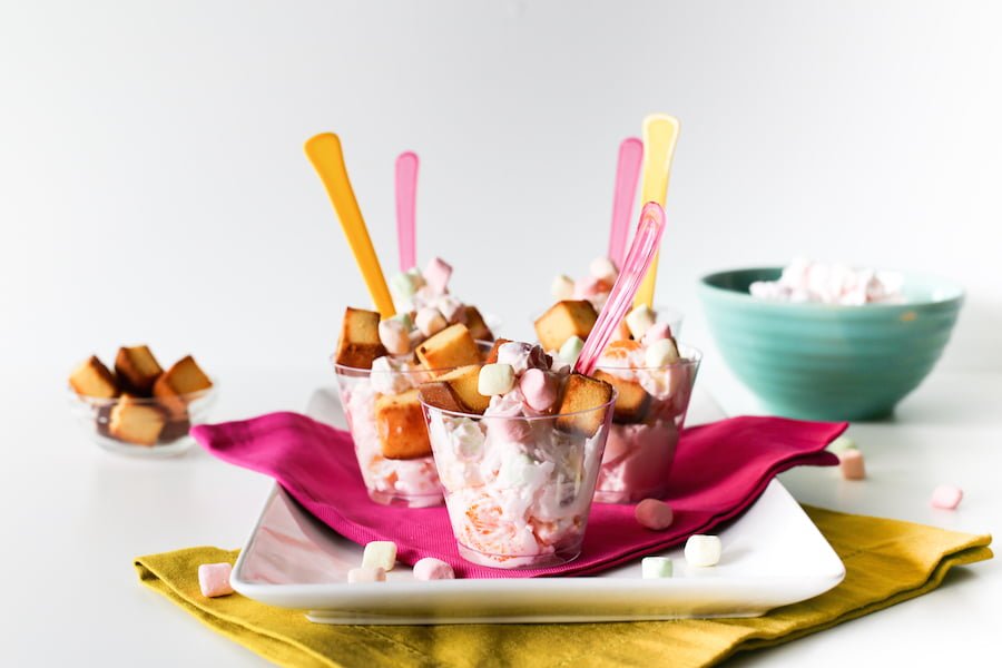 Try this throwback recipe with a fun twist: Ambrosia Salad with Pound Cake Croutons! Perfect for brunches, pool parties, tiki parties, or outdoor grilling! // saltycanary.com
