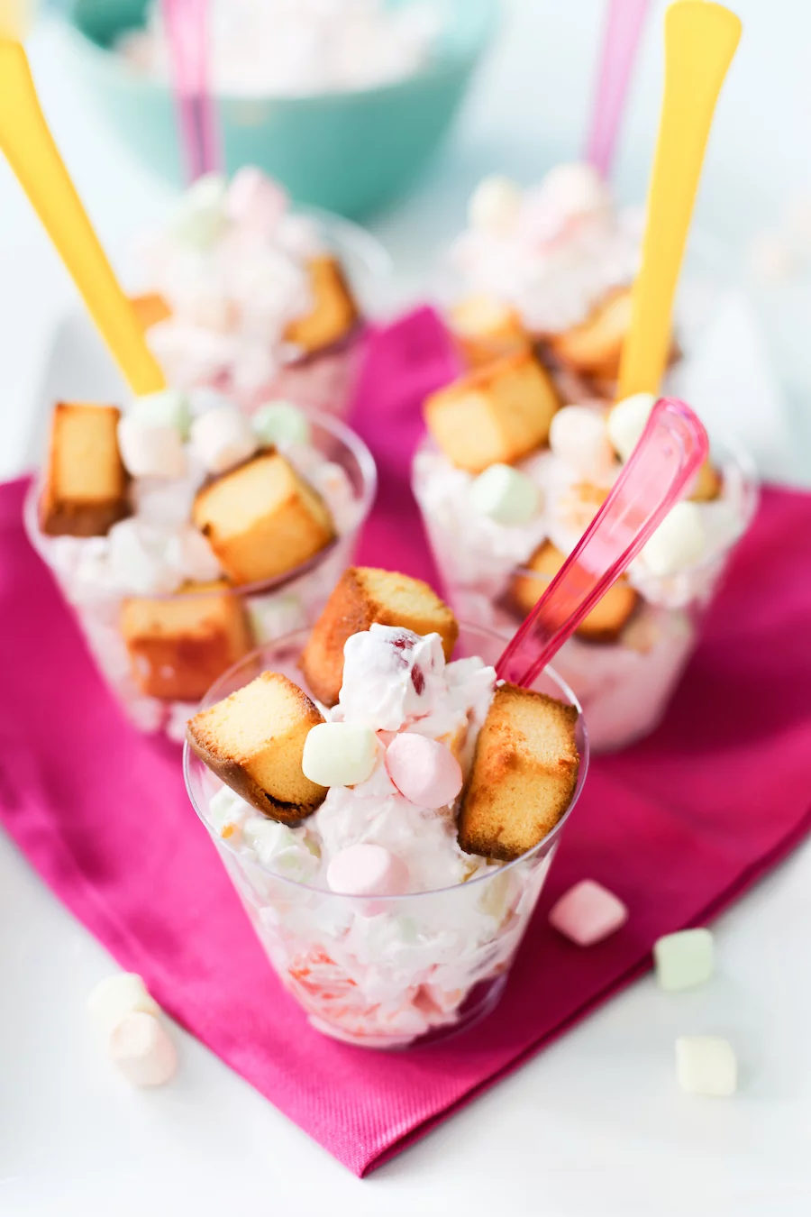 Try this throwback recipe with a fun twist: Ambrosia Salad with Pound Cake Croutons! Perfect for brunches, pool parties, tiki parties, or outdoor grilling! // saltycanary.com