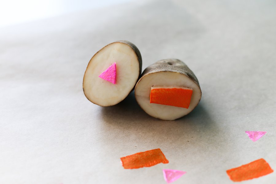 Upgrade your table cloth and brush up on your grade school art skills with this quick and easy DIY Potato Stamp! // Salty Canary