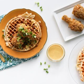 Try this fake baked fried chicken with savory waffles drizzled with a honey mustard sauce! // saltycanary.com