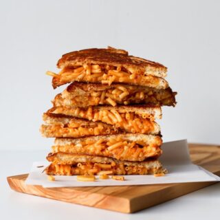 Mac And Cheese Grilled Cheese Sandwich // This is one comfort food stuffed into another comfort food and then grilled to perfection! // saltycanary.com