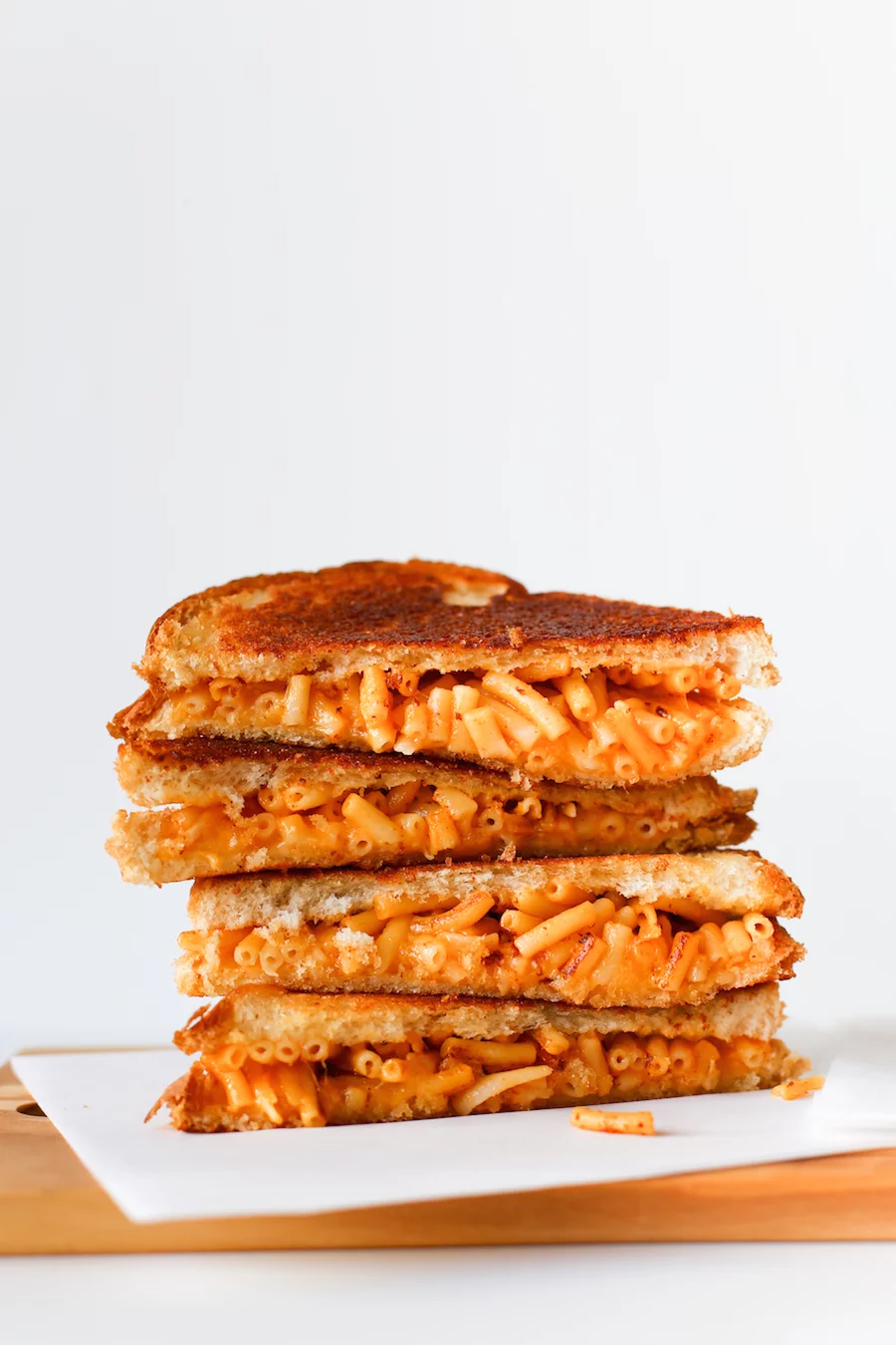 Mac And Cheese Grilled Cheese Sandwich // This is one comfort food stuffed into another comfort food and then grilled to perfection! // saltycanary.com