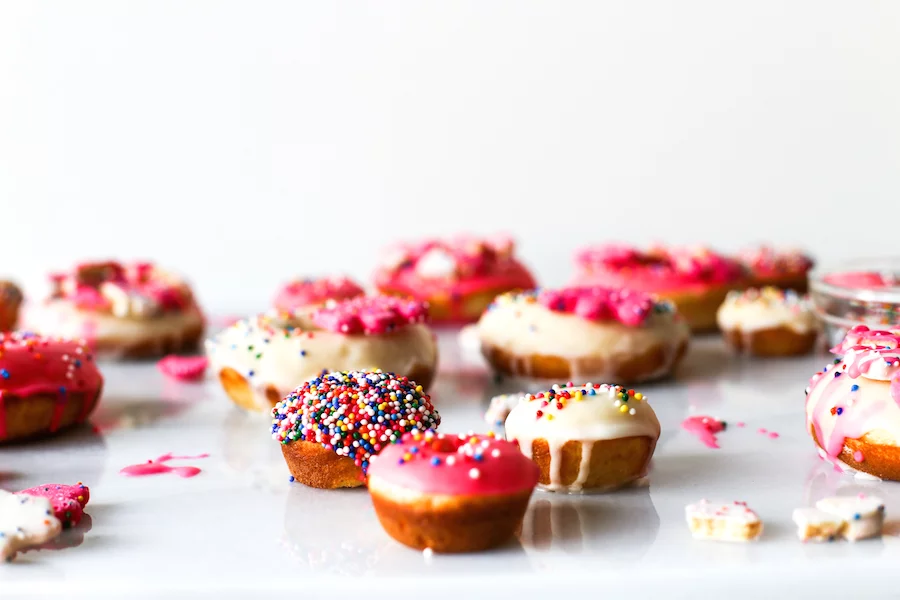 Make these Circus Animal Cookie Donuts for your next birthday or just to bring into the office to celebrate Friday! // saltycanary.com