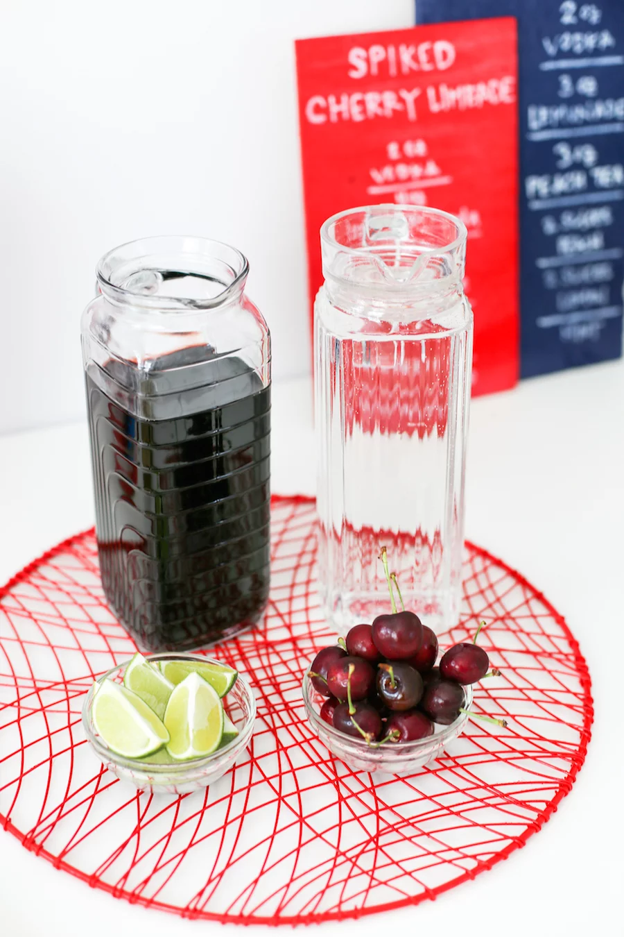 Throw a party with spiked cocktails for this summer's holiday! Cocktails can be a Spiked Cherry Limeade or Spiked Southern Peach Tea! // saltycanary.com