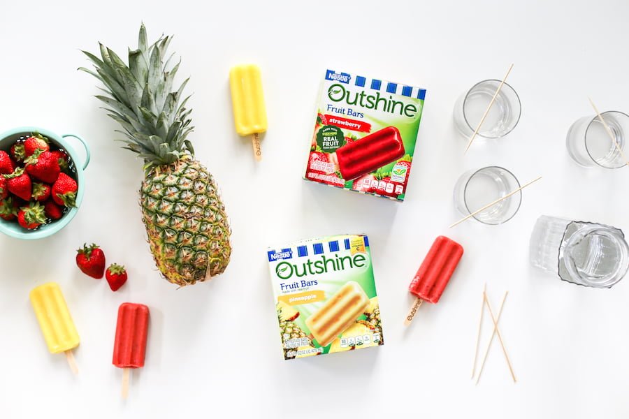 These Tropical Popsicle Mocktails might be my go-to summer treat! They are so good and they are perfect for serving at a party whether it's a pool party, tiki party, or just on a hot Saturday afternoon! // saltycanary.com