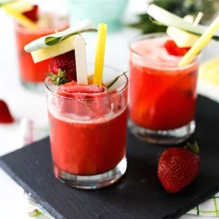 These Tropical Popsicle Mocktails might be my go-to summer treat! They are so good and they are perfect for serving at a party whether it's a pool party, tiki party, or just on a hot Saturday afternoon! // saltycanary.com