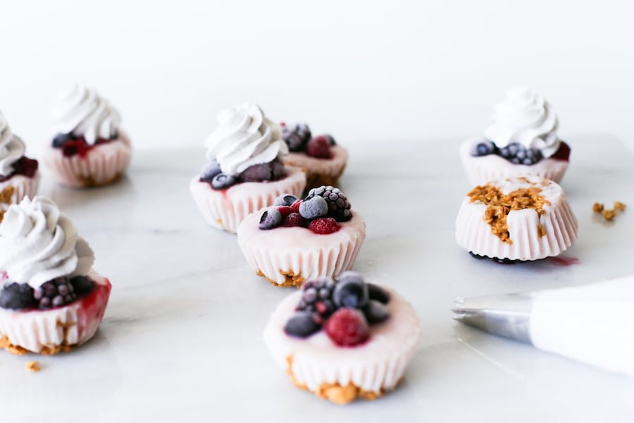 Since they're made in a cupcake pan, that makes them cupcakes right? No frosting, but add some blueberry whipped cream on top of these Yogurt Parfait Cupcakes! | saltycanary.com