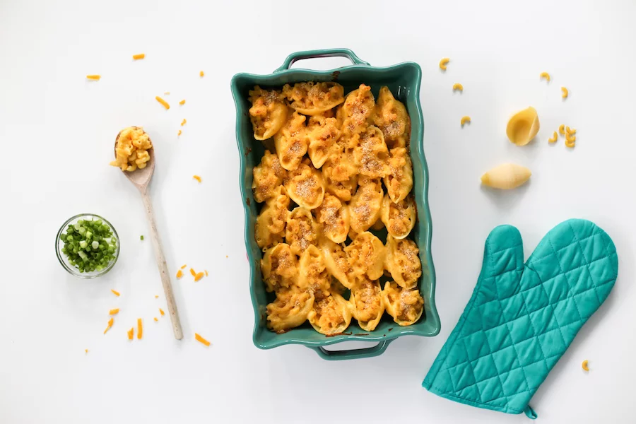 Are you ready for this? Mac and Cheese Stuffed Shells. Yes! That's cheese covered pasta stuffed into BIGGER PASTA and covered with MORE CHEESE! What?!?