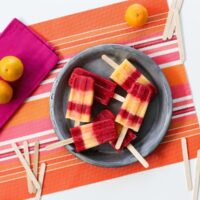 Cool off this summer with these Raspberry Tangerine Popsicles made with Emergen-C! // saltycanary.com