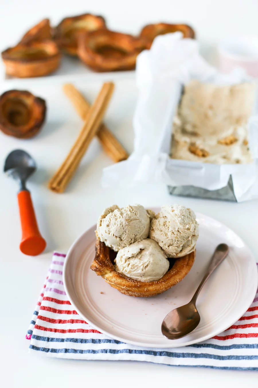 Go for churro overload and make this homemade Churro Ice Cream in homemade Churro Bowls! // Salty Canary