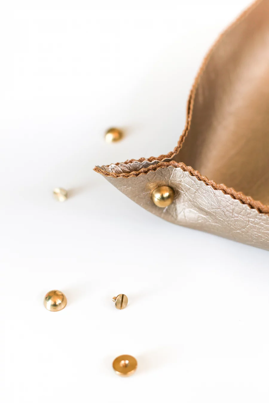 Too many things in your pockets or purse? Make a DIY Leather Catch-All and unload when you get home! // Salty Canary