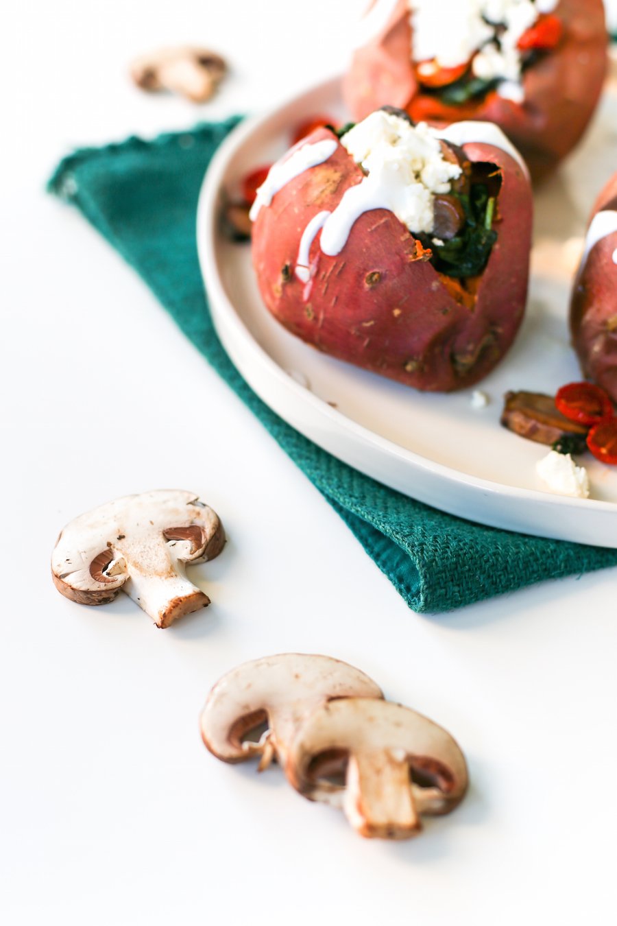 Mushroom Tomato Spinach and Feta Stuffed Sweet Potatoes // Salty Canary