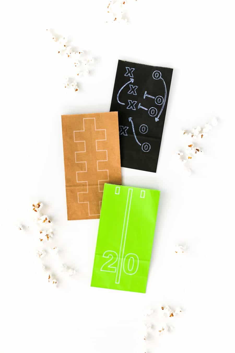 DIY Superbowl Popcorn Treat Bags made with the Cricut, Football Party, DIY Football Party Decorations, Free Football Themed SVG Cut Files, Gameday, Football Popcorn, Cricut Cutting Machine, Cricut DIY, Salty Canary