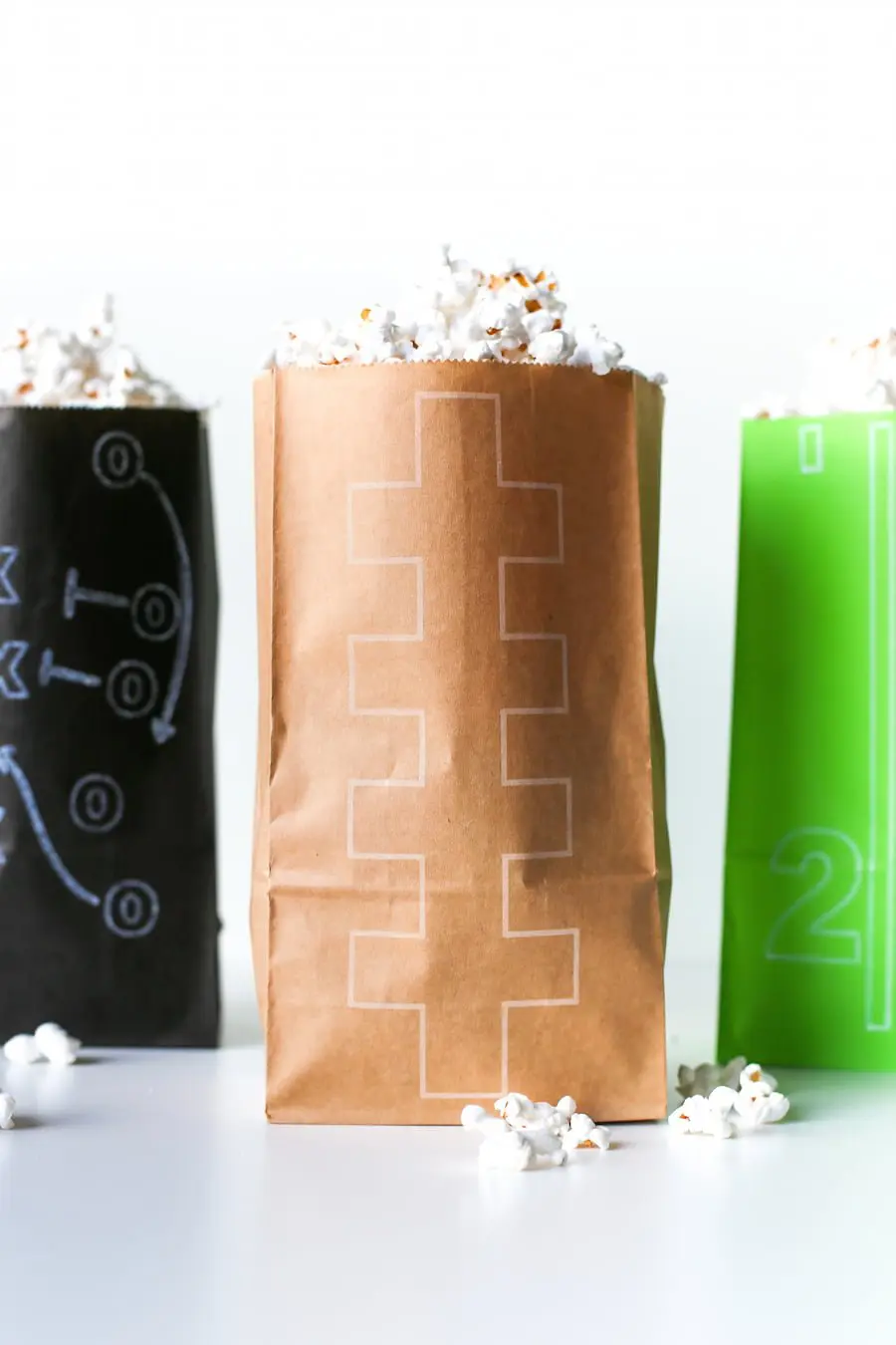 DIY Superbowl Popcorn Treat Bags made with the Cricut, Football Party, DIY Football Party Decorations, Free Football Themed SVG Cut Files, Gameday, Football Popcorn, Cricut Cutting Machine, Cricut DIY, Salty Canary