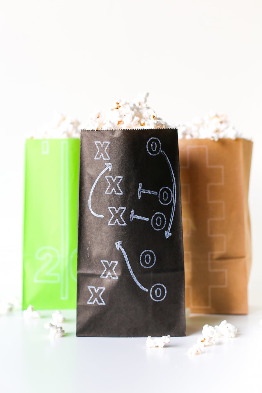 DIY Superbowl Popcorn Treat Bags made with the Cricut, Football Party, DIY Football Party Decorations, Free Football Themed SVG Cut Files, Gameday, Football Popcorn, Cricut Cutting Machine, Cricut DIY, Salty Canary