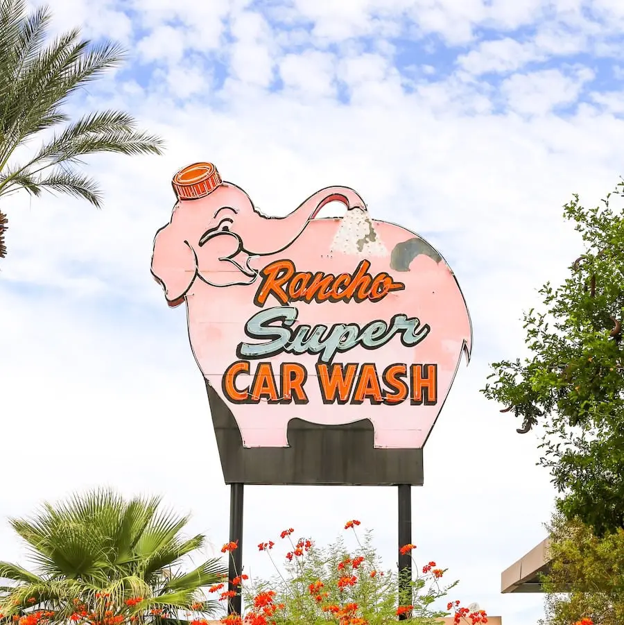 Vintage pink elephant neon carwash sign