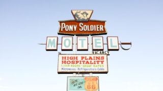 Route 66 Road Trip Ultimate Guide, Pony Soldier Motel Sign in Tucumcari, New Mexico