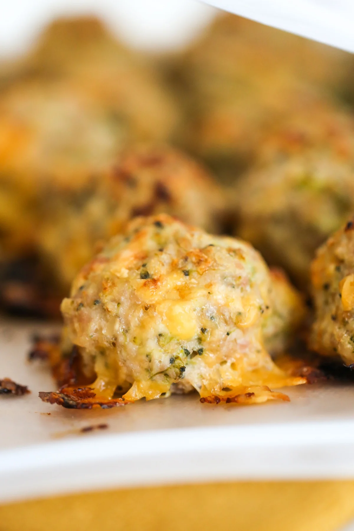 Close up of Cheesy Broccoli Turkey Meatballs in a freezer bag